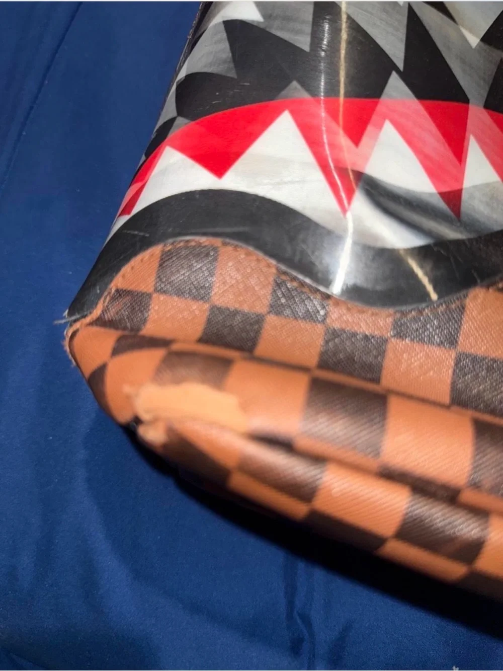 Sprayground Brown Checkered Shark Mouth Backpack with Red Accents